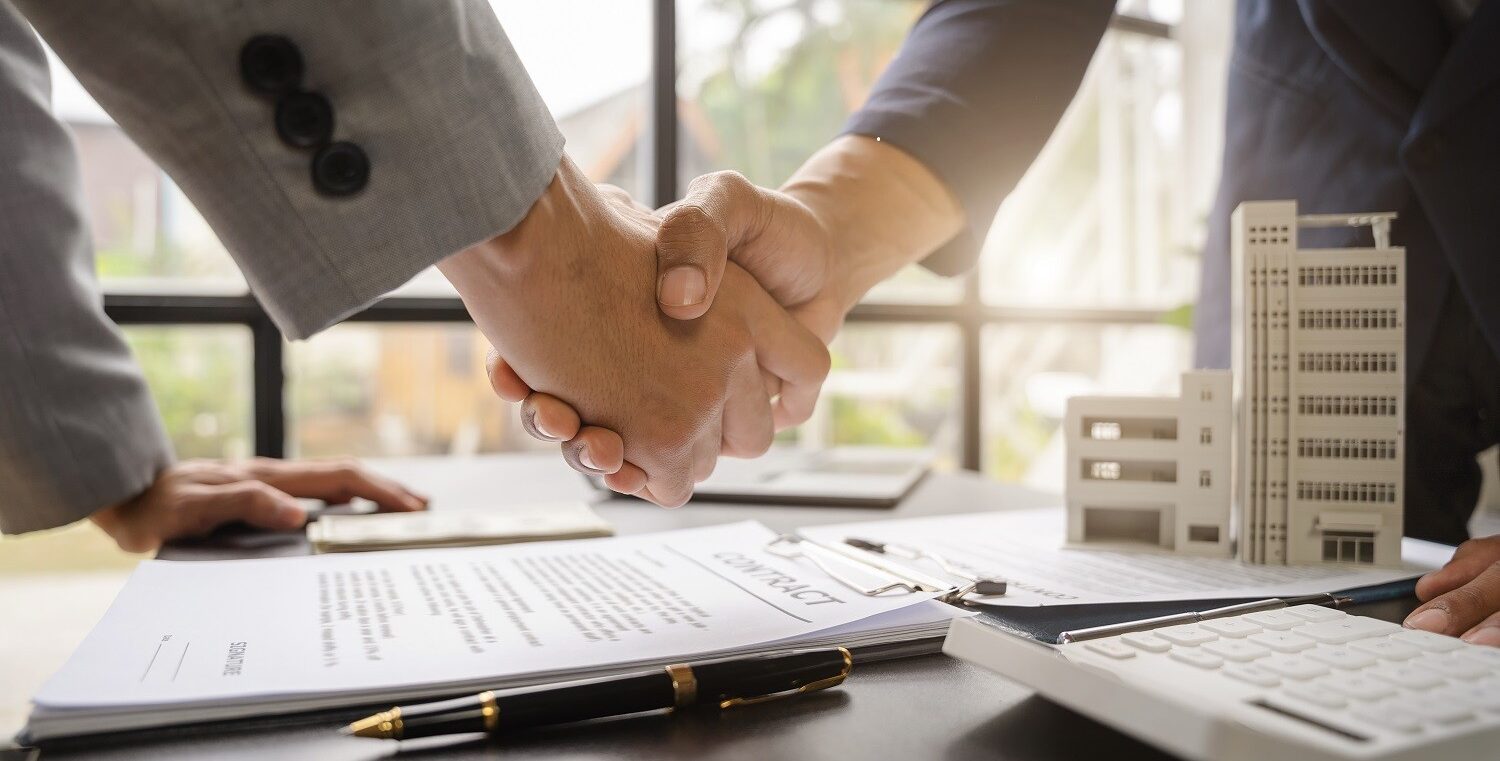 Close up hand shake, business deal agreement