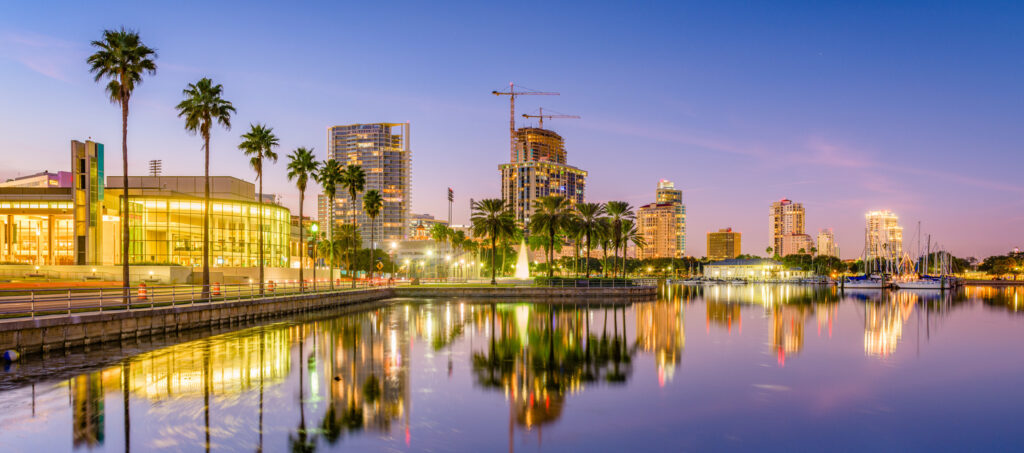 St. Petersburg Florida skyline reflecting on waterfront, representing coastal economy and business opportunities.